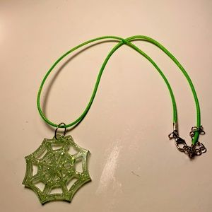 Halloween looks good.Green Halloween necklace.